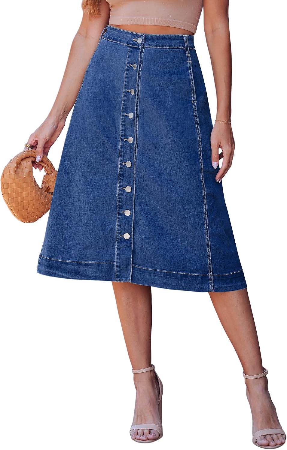 luvamia button-down midi denim skirt in a dark blue wash, A-line, on a model