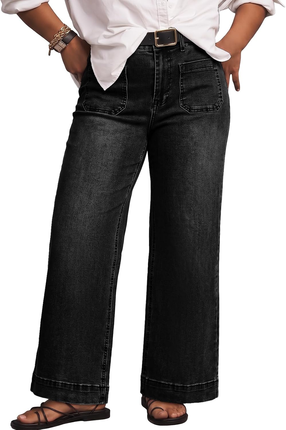 Eytino high-waisted plus size jeans in black, wide leg, full length on a model