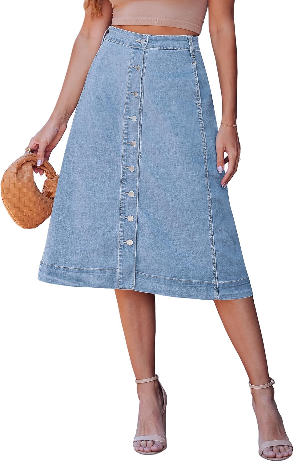 luvamia button-down midi denim skirt in a light blue wash, A-line, on a model