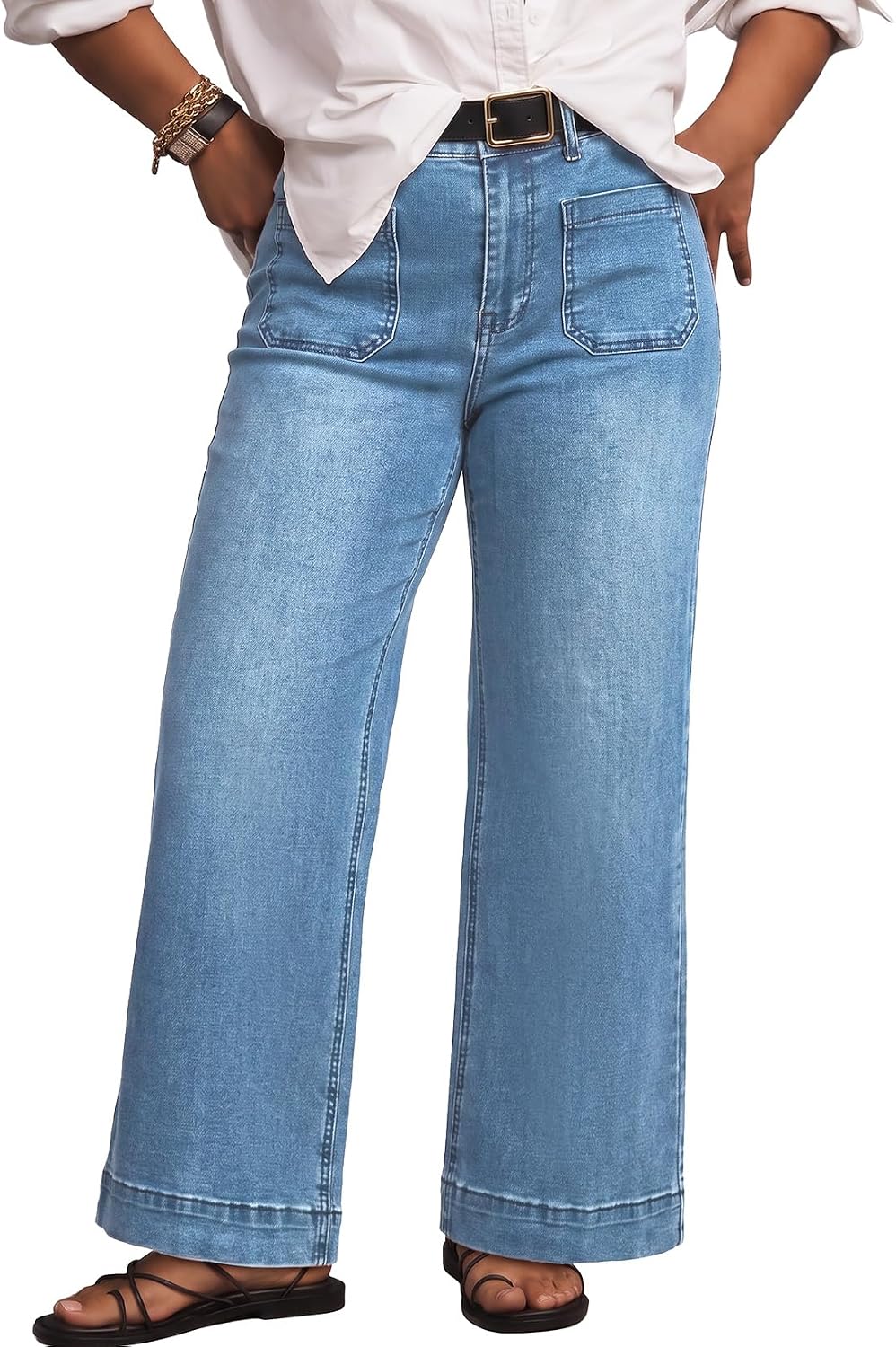 Eytino high-waisted plus size jeans in a mid blue wash, wide leg, full length on a model