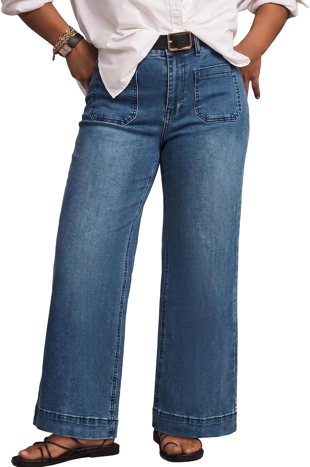 Eytino high-waisted plus size jeans in a medium blue wash, wide leg, full length on a model